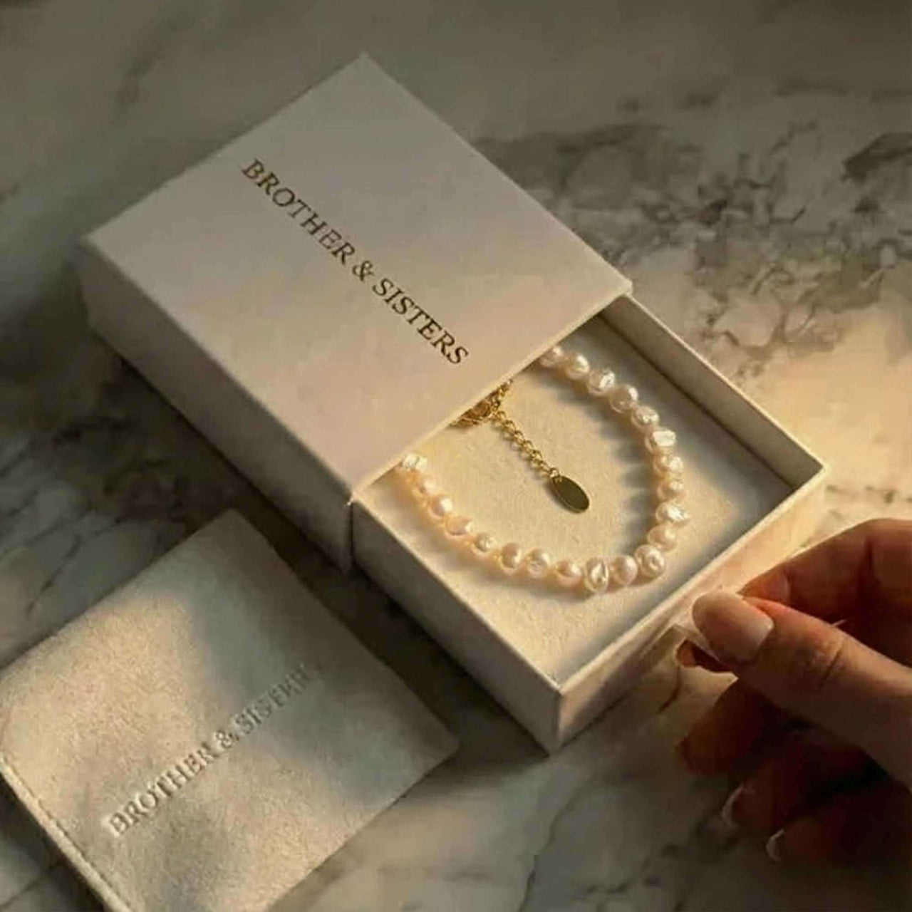 Sunseeker Pearl Choker by Brother & Sisters in elegant packaging with unique baroque pearls.