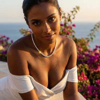 Thumbnail for Isolde Tennis Necklace worn by a model, featuring diamond simulants set in 18K gold, by Brother & Sisters.