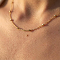 Thumbnail for Julia Beaded Chain Necklace featuring a delicate gold chain with tiny beads by Brother & Sisters.