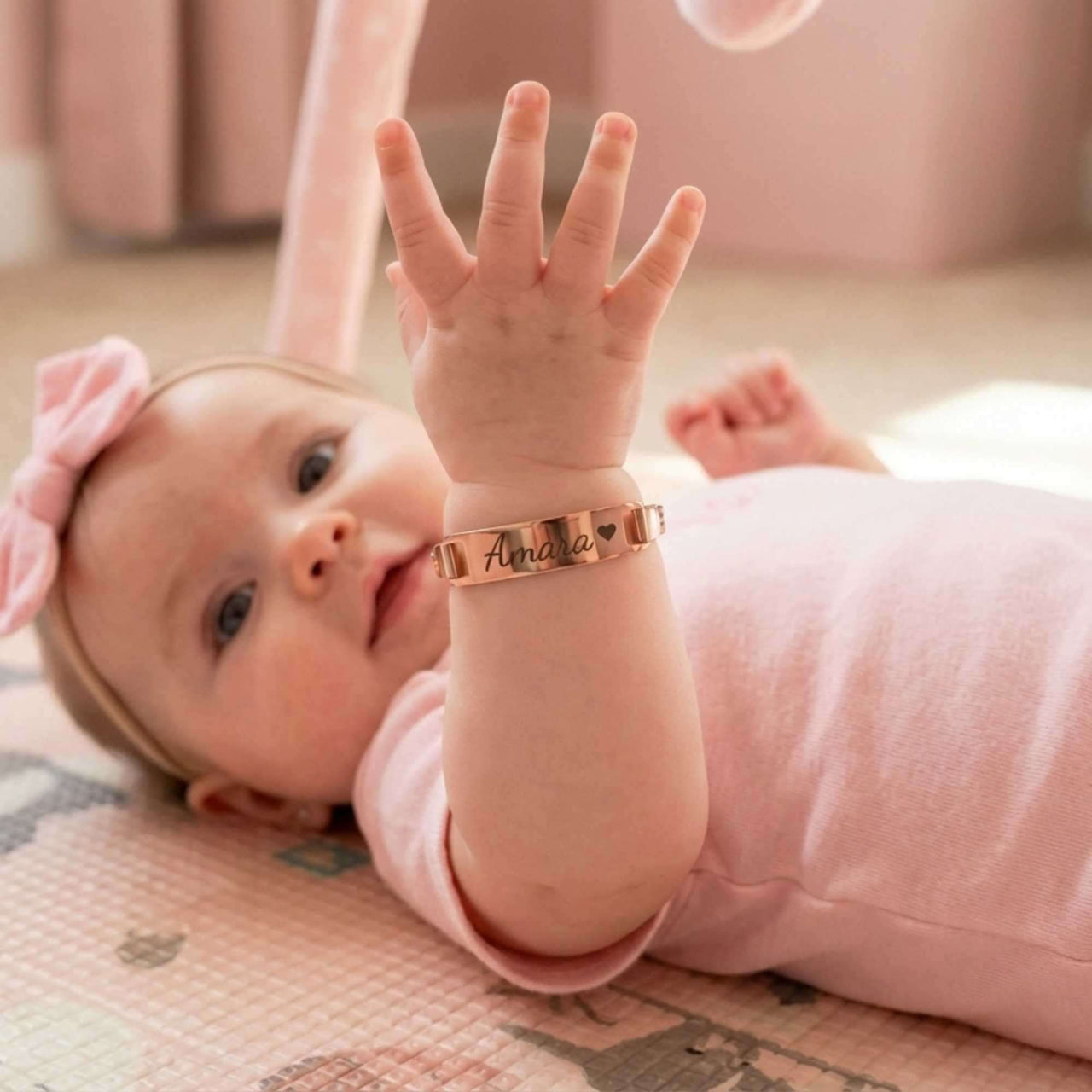Infant Bracelet on baby with name, personalized keepsake by Brother & Sisters, charm and elegance for little ones.