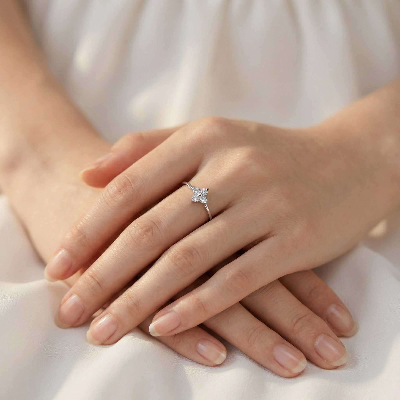 Crystal Flower Ring by Brother & Sisters with a four-leaf crystal flower and a delicate band catching light.