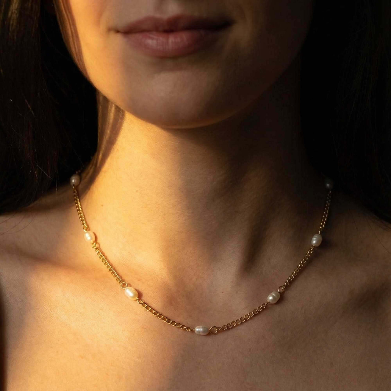 Dainty Pearl Choker featuring tiny freshwater pearls on a delicate gold chain by Brother & Sisters.