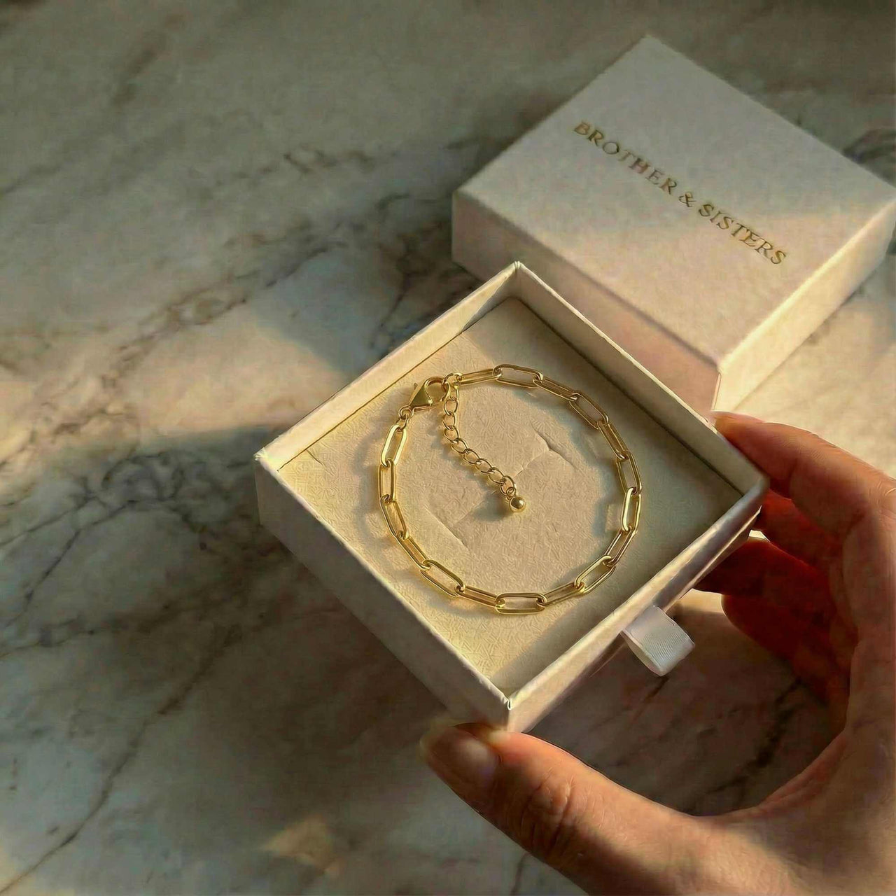Paperclip Chain Bracelet from Brother & Sisters in a gift box, featuring premium gold stainless steel links.