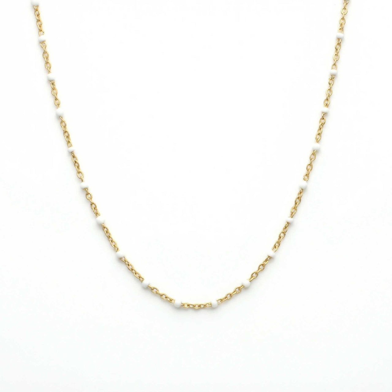 White Beaded Choker by Brother & Sisters featuring delicate gold chain and tiny white enamel beads.