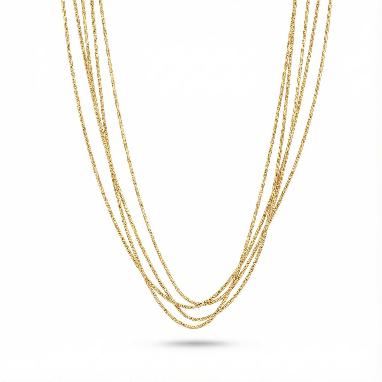 Riviera Layered Choker by Brother & Sisters featuring four delicate gold chains in a layered design.