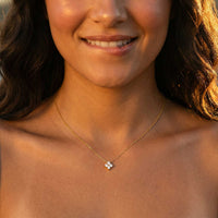 Thumbnail for Crystal Flower dainty necklace worn by woman — refined four-leaf zircon signature pendant at collarbone, everyday minimalist jewelry