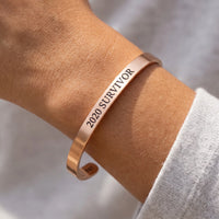 Thumbnail for Close-up of the 2020 Survivor bracelet in rose gold worn | SKU: 2020s-rg