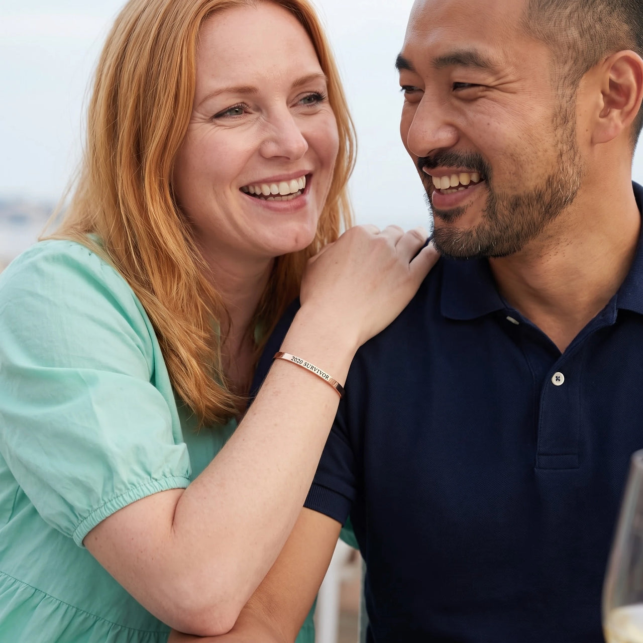 Couple moment, she wears the 2020 Survivor bracelet in rose gold | SKU: 2020s-rg