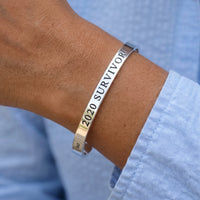 Thumbnail for Close-up of the 2020 Survivor bracelet in silver worn | SKU: 2020s-wg