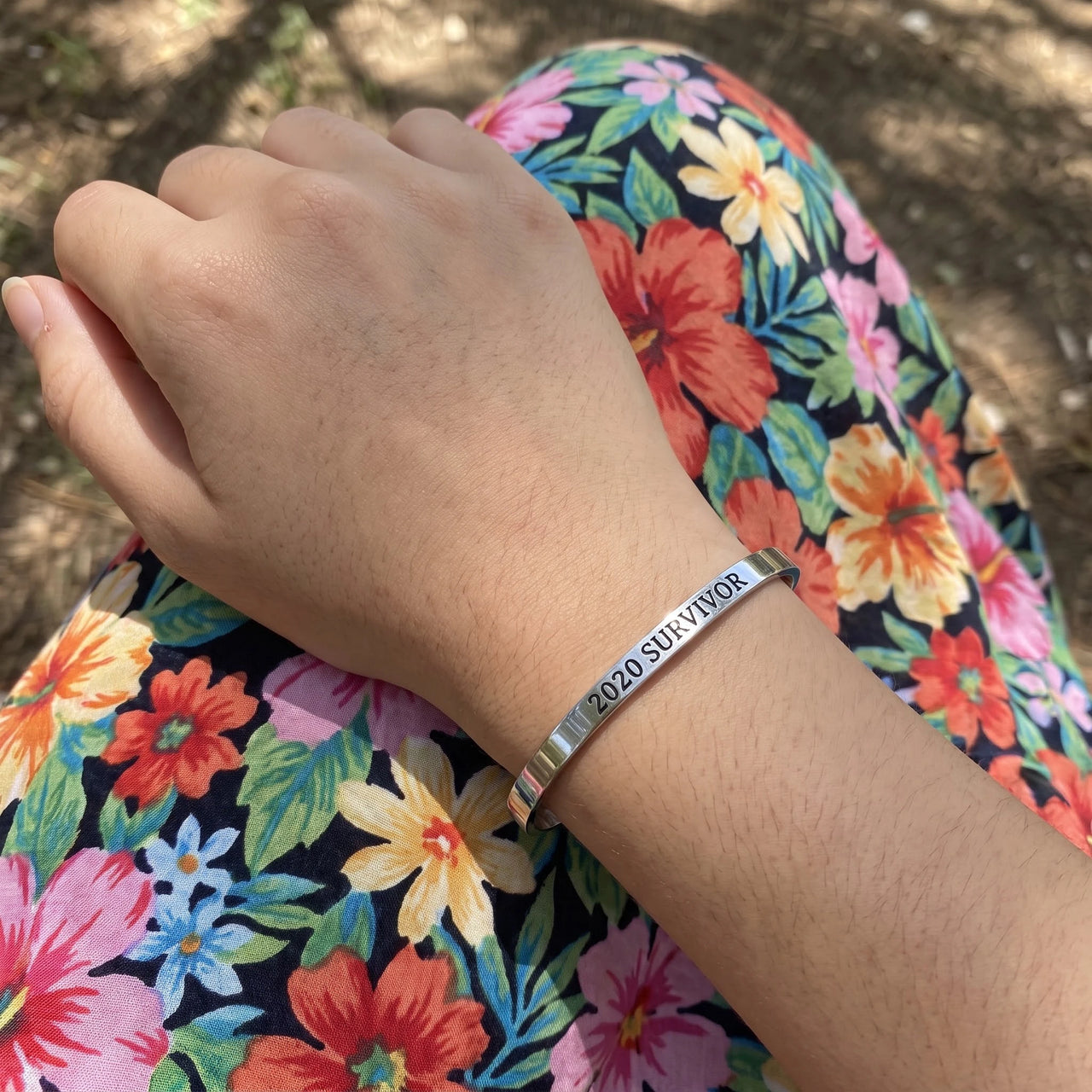 2020 Survivor bracelet in silver worn, showing its real size | SKU: 2020s-wg