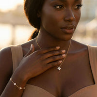 Thumbnail for Crystal Flower necklace worn by model, dainty four-leaf zircon pendant signature design