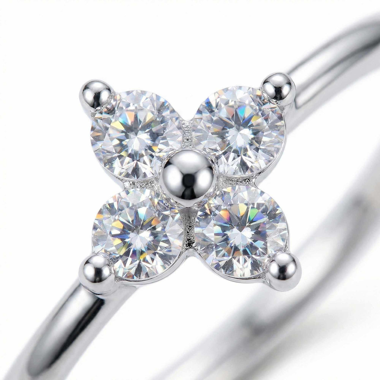 Crystal Flower Ring by Brother & Sisters featuring a delicate four-leaf design with brilliant-cut zirconia stones.