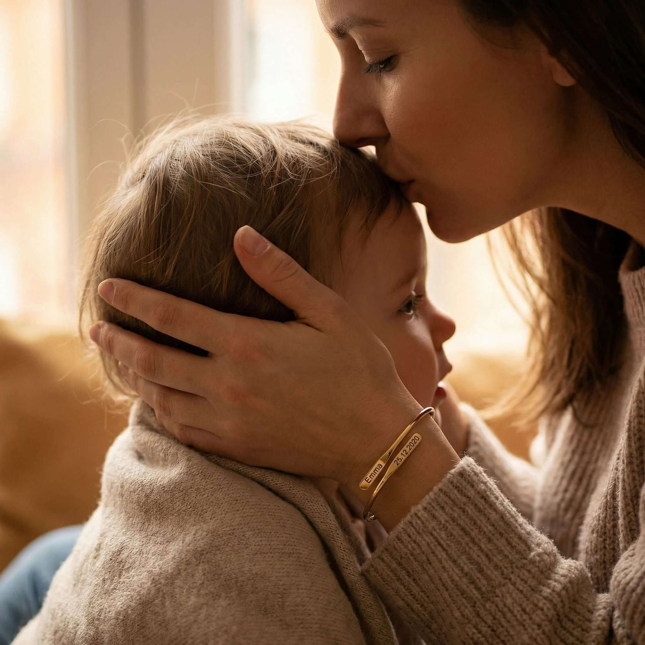 Wrap Couple Bracelet worn by a mother kissing her child, showcasing love and connection. Brand: Brother & Sisters.