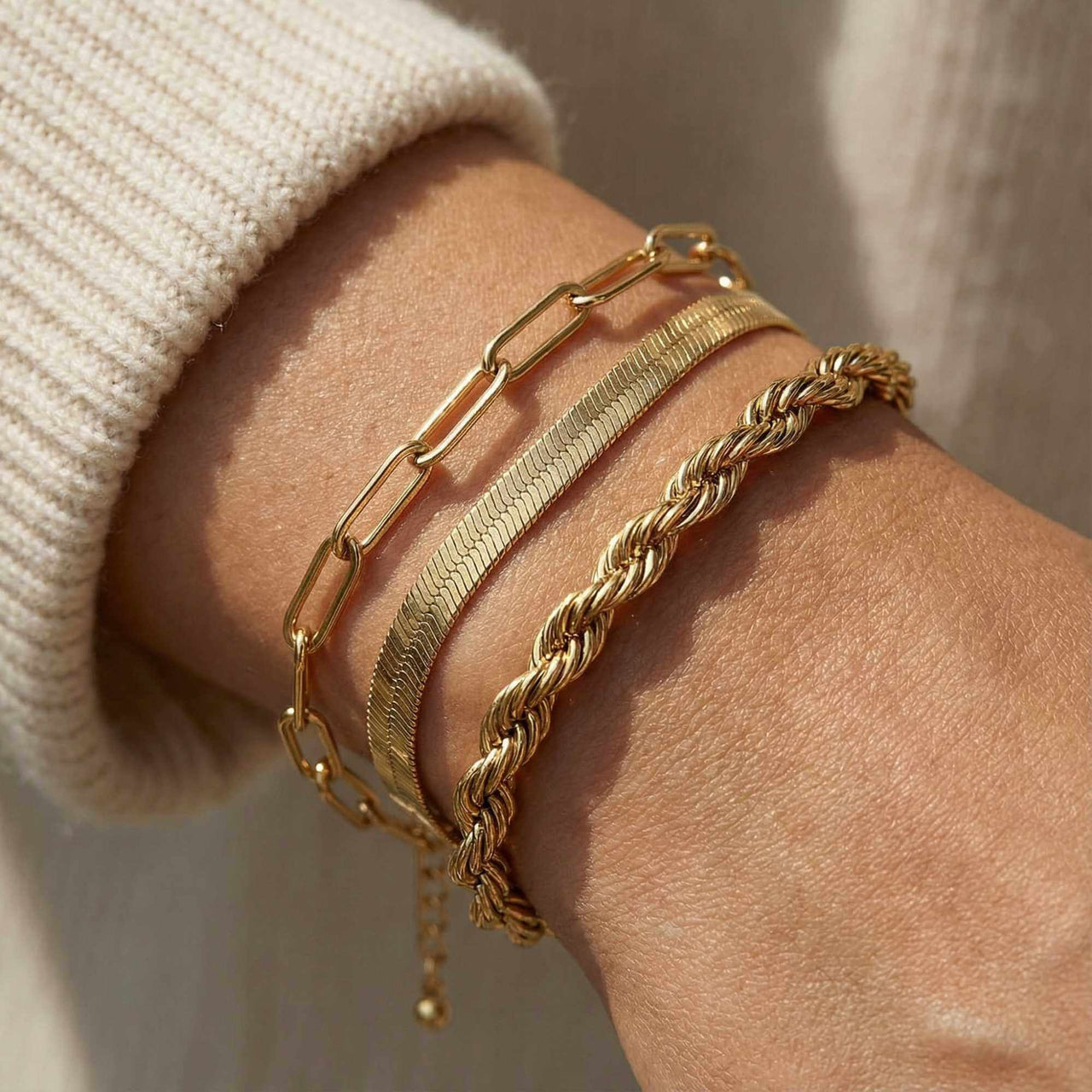 Stylish Paperclip Chain Bracelet by Brother & Sisters on a wrist, showcasing clean links and gold design.