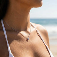 Thumbnail for Crystal Flower necklace by Brother & Sisters featuring dainty four-leaf zircon pendant with diamond-like brilliance