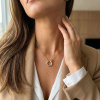 Thumbnail for The Unity Bond necklace by Brother & Sisters featuring a silver circle and gold bar pendant.