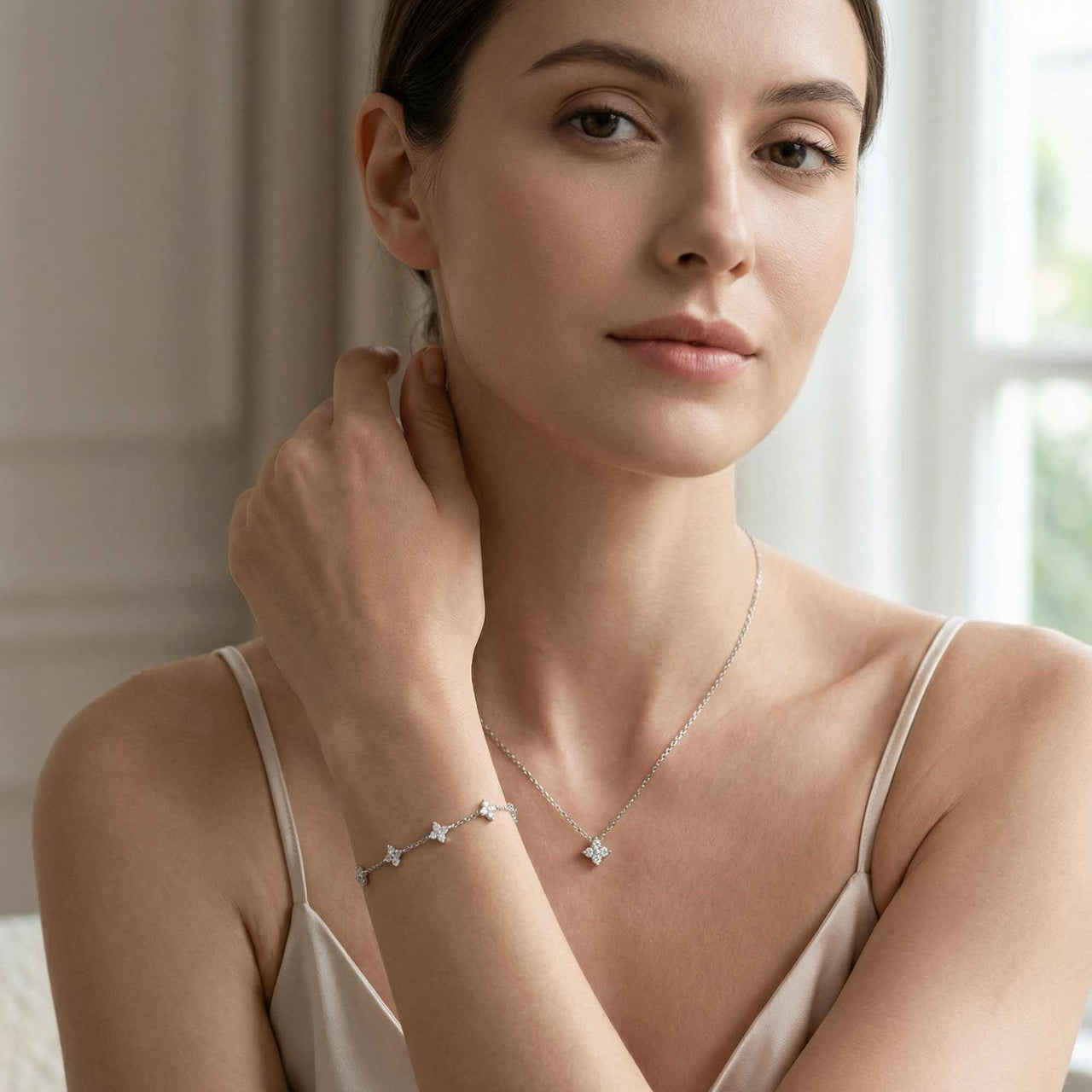 Crystal Flower necklace by Brother & Sisters, dainty refined four-leaf zircon crystal flower pendant signature