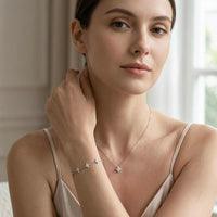 Thumbnail for Crystal Flower necklace by Brother & Sisters, dainty refined four-leaf zircon crystal flower pendant signature