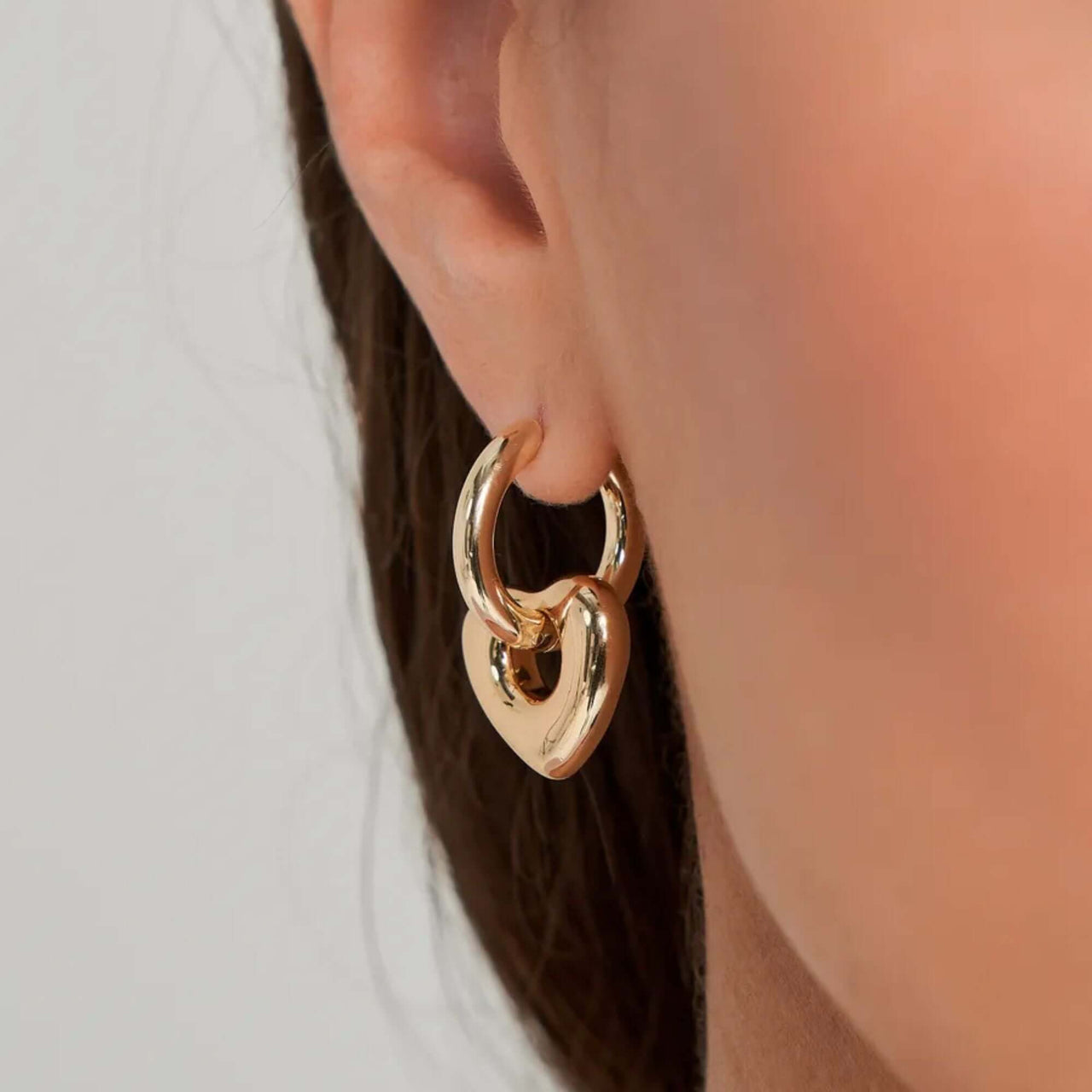 Aurora Heart Hoops gold earrings from Brother & Sisters designed for elegance and everyday wear.