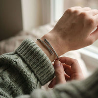 Thumbnail for Close-up of a Wrap Couple Bracelet featuring custom engravings, showcasing the delicate design by Brother & Sisters.
