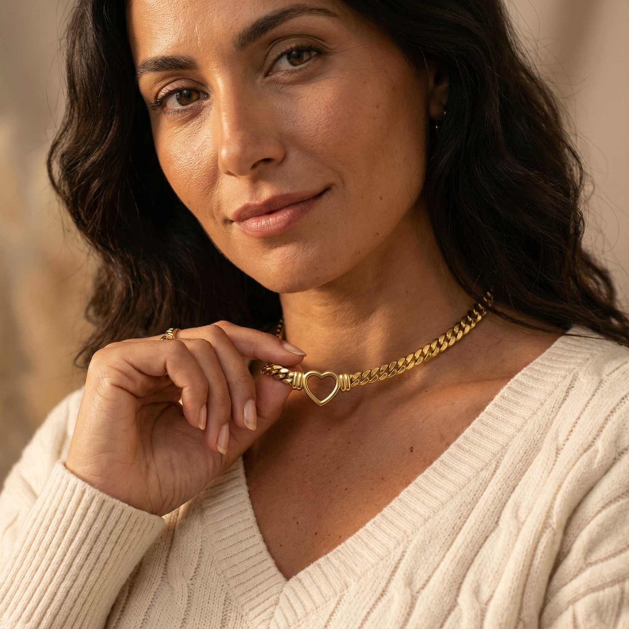 Vali Heart Choker Necklace worn by a woman featuring a chunky Cuban chain and delicate heart, by Brother & Sisters.