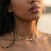 Thumbnail for Elegant White Beaded Choker by Brother & Sisters, featuring white enamel beads on a delicate gold chain.