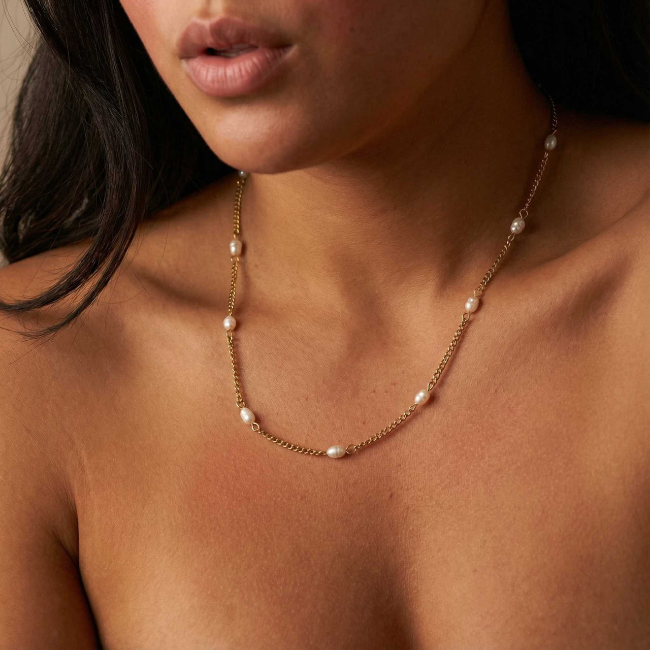 Dainty Pearl Choker featuring tiny freshwater pearls on a delicate gold chain by Brother & Sisters.