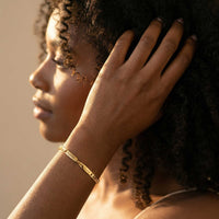 Thumbnail for Infinity Bond Matching Bracelet showcased on a model, featuring intertwined names and elegant design by Brother & Sisters.