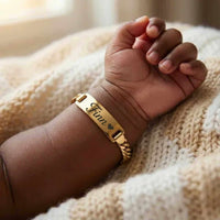 Thumbnail for Infant Bracelet featuring personalized name 'Finn' by Brother & Sisters, elegant keepsake for newborns.