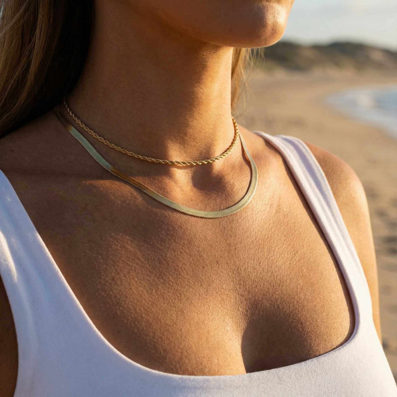 Rope Chain Necklace worn on a model at the beach, featuring a classic twisted texture by Brother & Sisters.