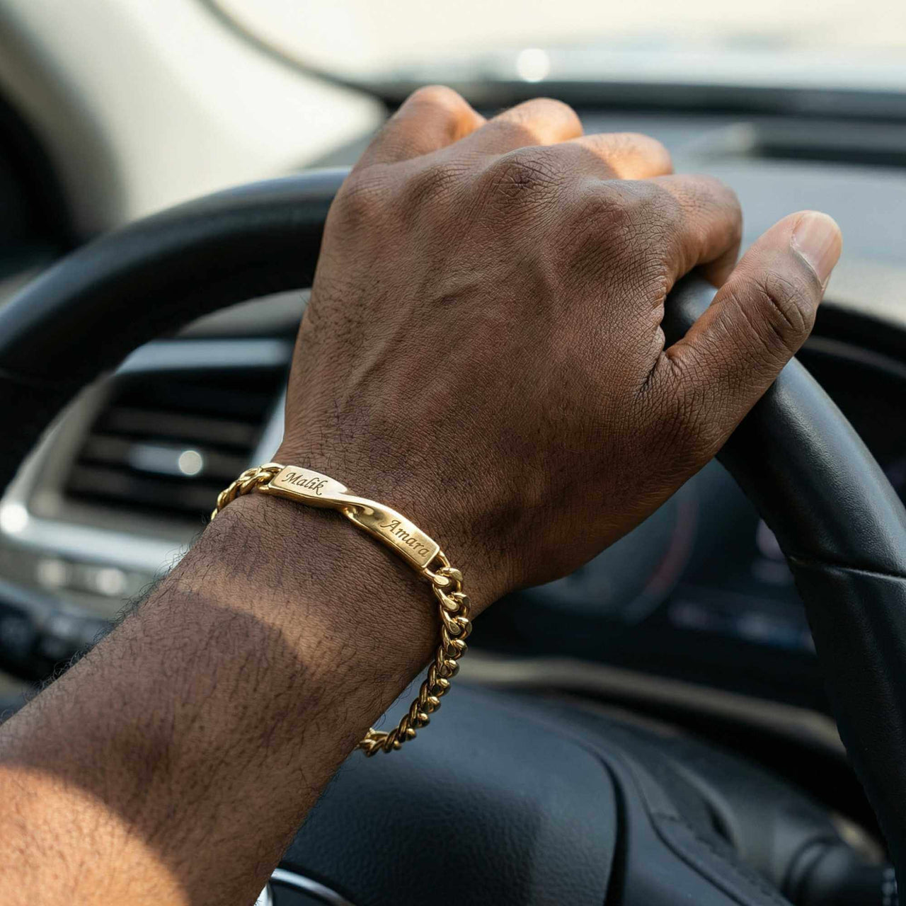 Infinity Bond Matching Bracelet worn on a hand while driving, showcasing its elegant design by Brother & Sisters.