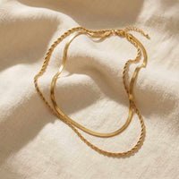 Thumbnail for The Double Luxe double-chain necklace by Brother & Sisters featuring a sleek herringbone and delicate rope chain.