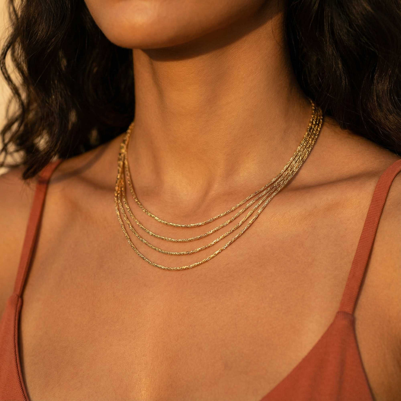 Riviera Layered Choker by Brother & Sisters features four delicate chains cascading at different lengths.