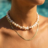 Thumbnail for Sunseeker Pearl Choker featuring unique baroque pearls with organic shapes on a golden chain by Brother & Sisters.