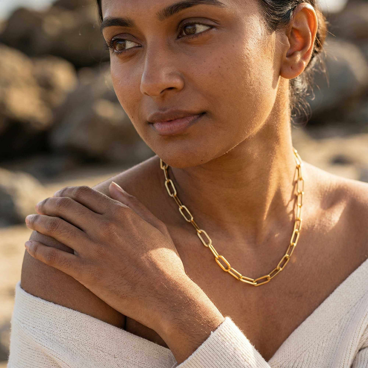 Ria Paperclip Chain Necklace worn by a woman, showcasing bold oversized links and chic style by Brother & Sisters.