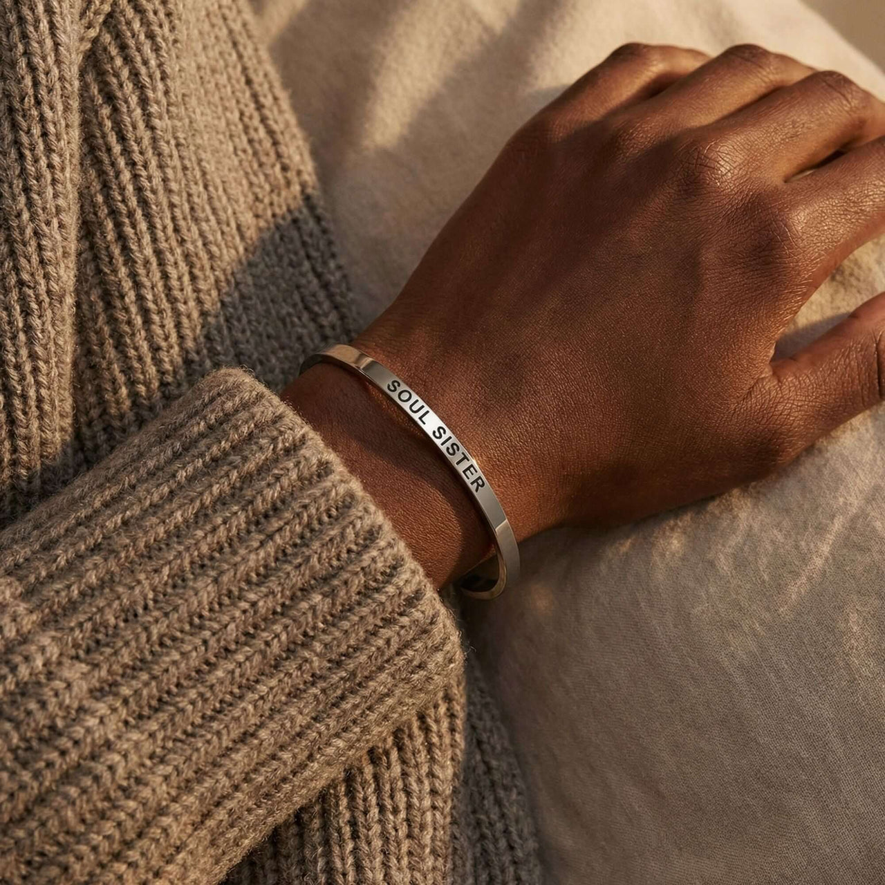 Matching Couple Bracelet from Brother & Sisters featuring a minimalist design with 'SOUL SISTER' engraving.