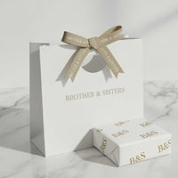 Thumbnail for Elegant gift wrapping & bag by Brother & Sisters, featuring refined design and a stylish bow, perfect for every occasion.