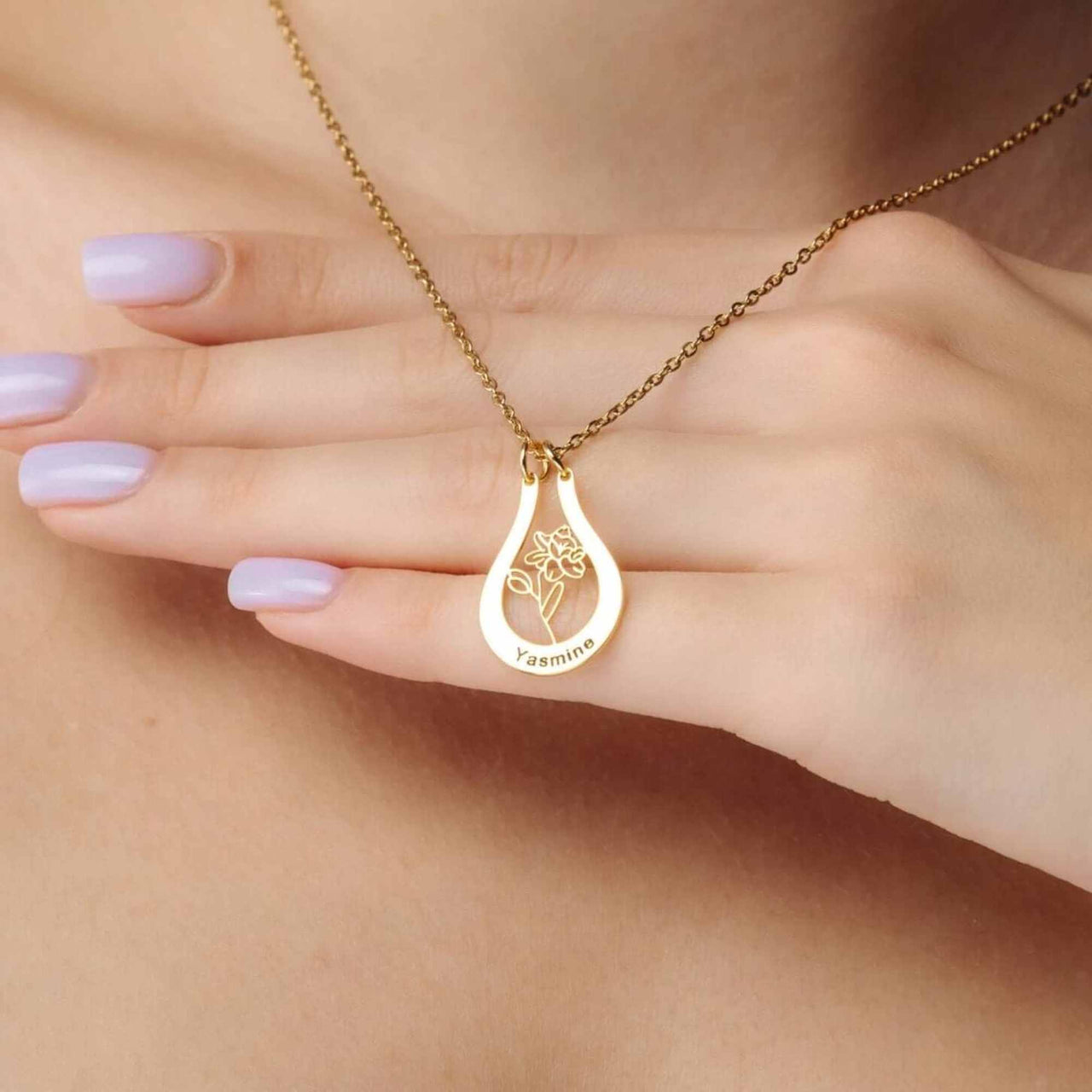 Birth Flower Name Necklace featuring a personalized gold pendant with the name Yasmine and a flower design by Brother & Sisters.