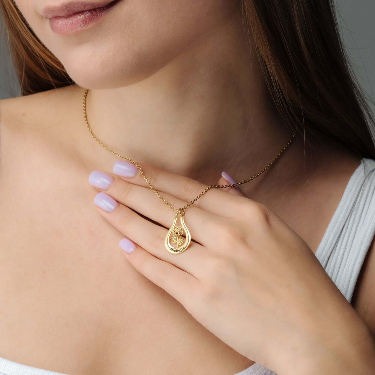 Birth Flower Name Necklace worn by a woman, showcasing its elegance and design by Brother & Sisters.