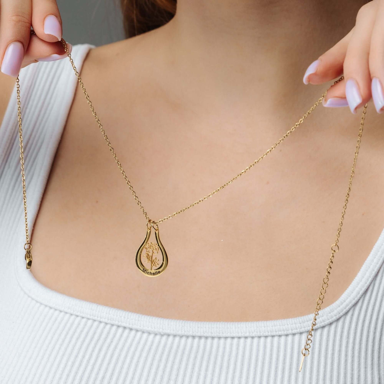 Birth Flower Name Necklace by Brother & Sisters featuring a personalized gold pendant with birth flower design.