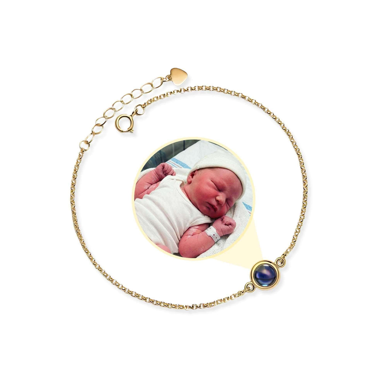 Photo Projection Bracelet by Brother & Sisters featuring a customizable photo locket of a newborn.