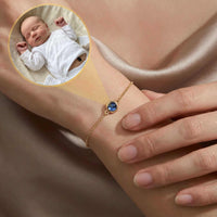 Thumbnail for Photo Projection Bracelet featuring a baby's ultrasound image, designed by Brother & Sisters for sentimental mothers.
