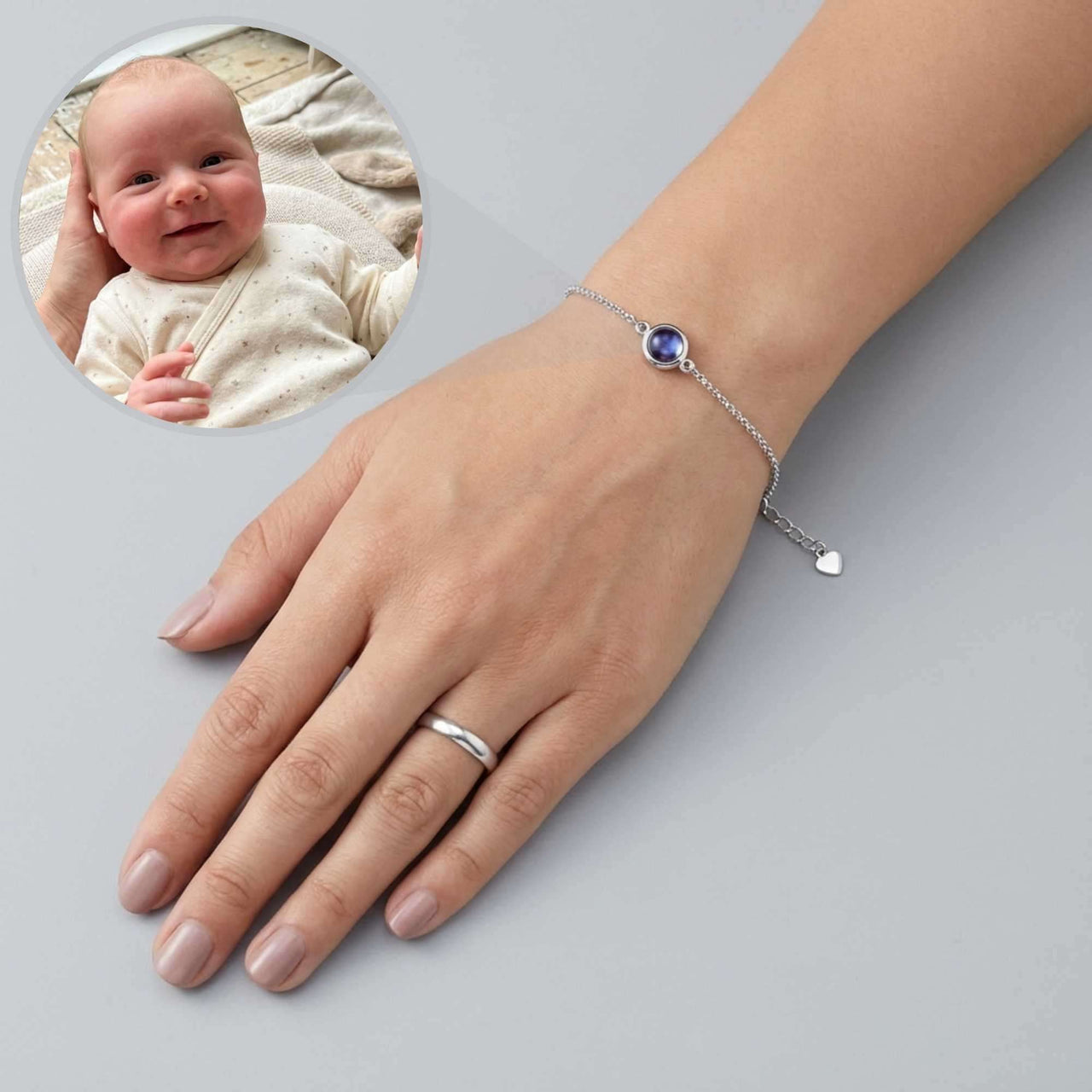 Photo Projection Bracelet featuring a baby's ultrasound image, from brand Brother & Sisters, cherished keepsake.