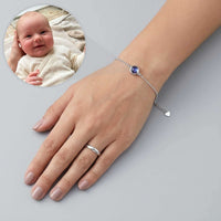 Thumbnail for Photo Projection Bracelet featuring a baby's ultrasound image, from brand Brother & Sisters, cherished keepsake.