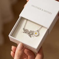 Thumbnail for Daisy Name Necklace in gift box by Brother & Sisters with engraved names and enamel daisy design.
