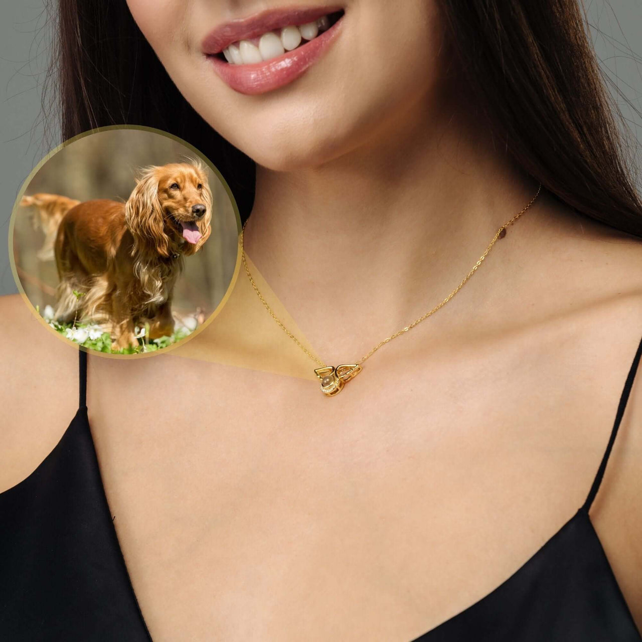 Woman wearing Angel Photo Necklace by Brother & Sisters, featuring angel wings design with a photo of a golden retriever.