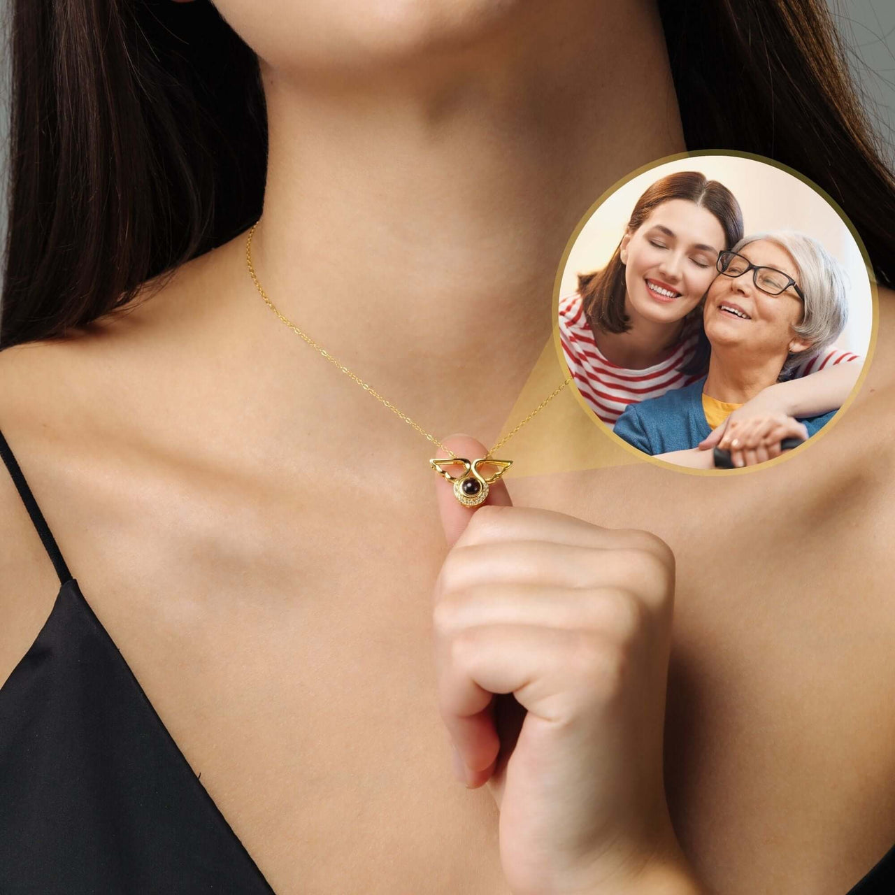 Angel Photo Necklace showcasing a delicate angel wings design, symbolizing love and remembrance by Brother & Sisters.