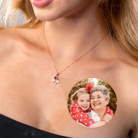 Thumbnail for Angel Photo Necklace featuring a sentimental design with a photo projection of a grandmother and granddaughter.