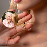 Thumbnail for Angel Photo Necklace featuring a sentimental projection photo and elegant angel wing design by Brother & Sisters.