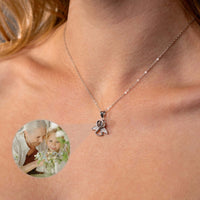 Thumbnail for Angel Photo Necklace featuring a timeless angel wing design by Brother & Sisters, perfect to carry loved ones close.